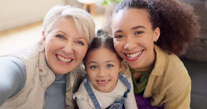 Happy family, smile and selfie on a sofa with mother, grandmother and girl child in their home. Face, love and portrait of interracial women in a living room for photo, bonding and profile picture