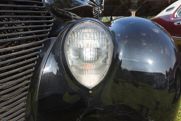 Oval HeadLight from 1937 Black Ford. 