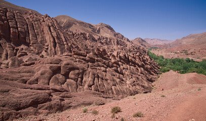 Mountain ridge called Monkey Fingers or Monkey paws in Dades gorge, Atlas Mountains, Morocco. Rocks that look like fingers rising from the earth. Unique walking trail in oasis in the Atlas Mountains.