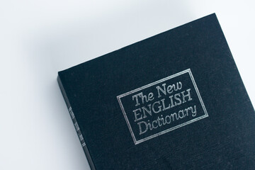 Large Black English Dictionary Isolated on White Background.