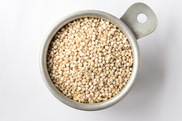 Uncooked White Quinoa in a Measuring Cup
