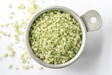 Uncooked Jade Rice in a Measuring Cup © Michelle