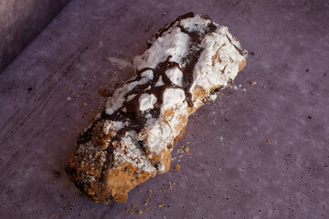 chocolate cigar pastry pastries baked goods bakery powdered sugar chocolate cinnamon cocoa hands...