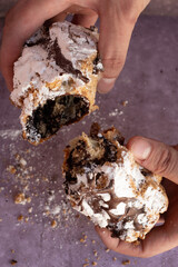 chocolate cigar pastry pastries baked goods bakery powdered sugar chocolate cinnamon cocoa hands holding