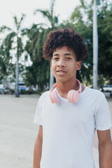 portrait of young man with dreadlocks in downtown in Latin America, Caribbean and African american people