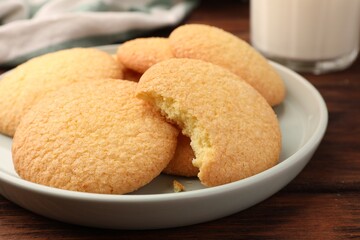 Delicious Danish butter cookies on wooden table, closeup