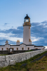 Fototapeta na wymiar Sunset over Mull of Galloway Lighthouse, Mainland Scotland, UK