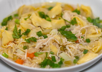 Traditional chicken agnolini (capeletti) soup. winter soup