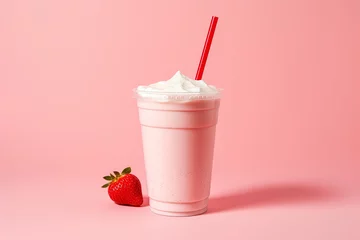 Zelfklevend Fotobehang Strawberry milkshake in plastic takeaway cup isolated on pink background © agungai
