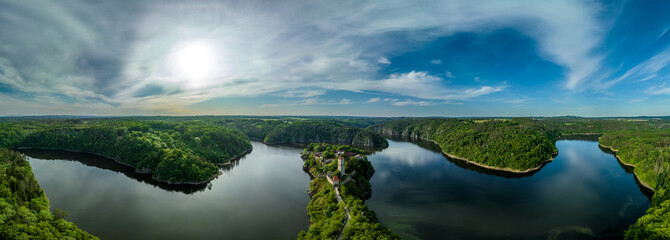 Aerial view of early Gothic Zvikov castle on difficult-to-access and steep promontory above the...