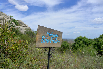sign on a mountain, welcome to the trail