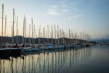 Fototapeta na wymiar Yachts and boats in Fethiye Ece Marina, Mugla province, Turkey - may 2023