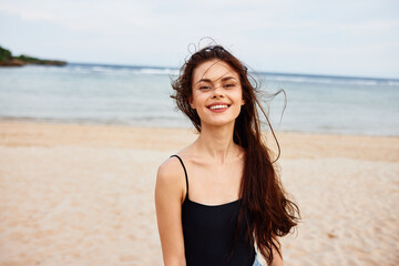 ocean woman beach smile sea summer young nature sand dress vacation