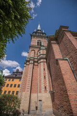 Perspective view of the church Tyska kyrkan tower and apse in the old town Gamla Stan, a sunny...