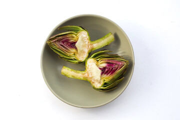 Fresh artichoke on white background.