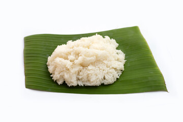 Sticky rice on banana leaf on white background.