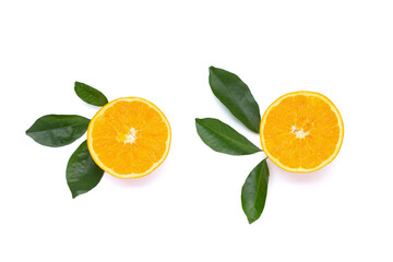 Orange fruit with green leaves on white background.
