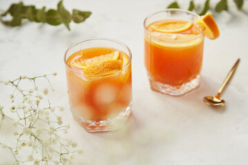 Summer fresh cocktail with grapefruit and orange. Low alcohol, zero proof drinks. Trendy shadows