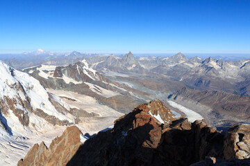 Panorama view with mountain Matterhorn (middle) and Mont Blanc (left) in Pennine Alps, Switzerland