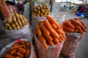 The red and yellow carrots in the bazaar.