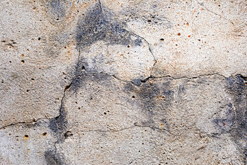 abstract background of gray cracked concrete on the wall. Modern design