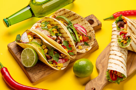 Mexican food featuring tacos, burritos, nachos, burgers
