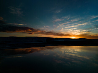 Fototapeta na wymiar Tranquil Sunset Panorama at Malham Tarn, Yorkshire.