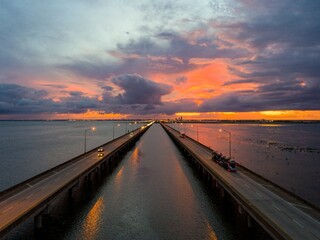 Jubilee Parkway bridge at sunset on Mobile Bay