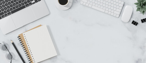 Top view of modern workspace with blank notebook, office supplies and copy space.