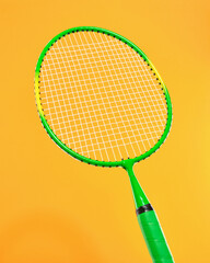 Tennis accessories. Green tennis racket. Healthy lifestyle concept.