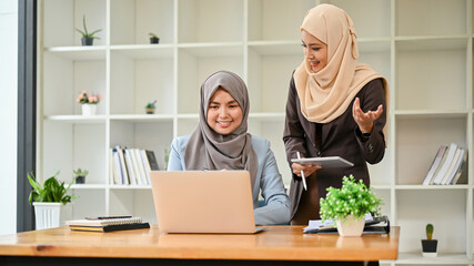 Professional Muslim business team working together in the office room.
