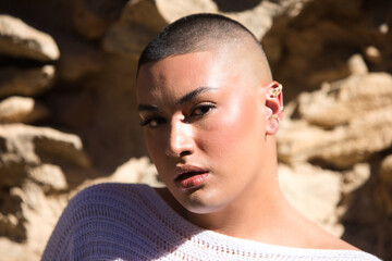 Non binary latin and young person, he is a professional make-up artist and he is showing off his...