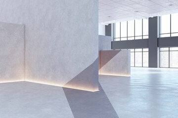 Obraz premium Modern concrete exhibition hall interior with window and city view, sunlight and shadows. Museum and art concept. 3D Rendering.