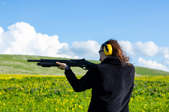 Woman with gun