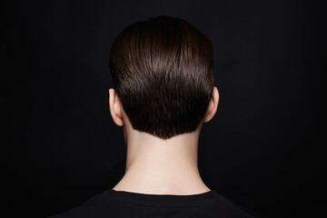 man with stilish haircut. male back. Boy with trendy Haircut