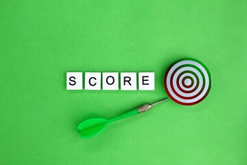 arrows and alphabet letters with the word score. the concept of target or score