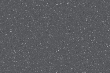 Dark grey granite texture with light and dark flakes. Texture of gray granite pattern. Granite background texture.