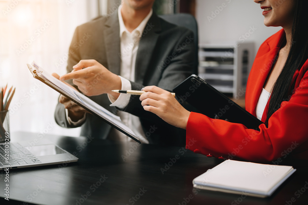 Poster business documents on office table with smart phone and calculator digital tablet and graph business