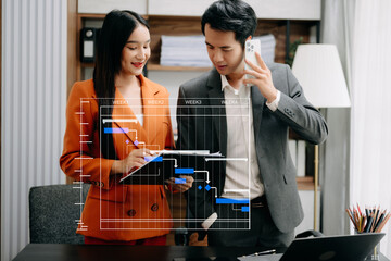 Project manager working and update tasks with milestones progress planning and Gantt chart scheduling diagram. business working with smart phone, tablet and laptop