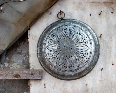 copper material colander, vintage sieve, close-up.
