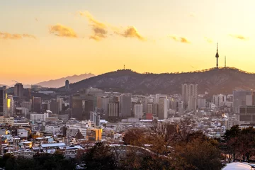 Fototapeten Cityscap of seoul city from top of mountain at sunset, South korea © byjeng