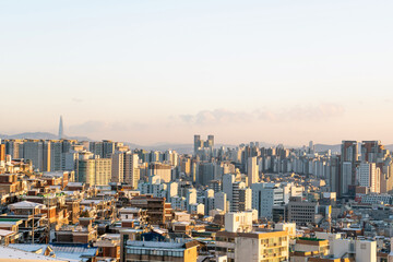 Cityscap of seoul city from top of mountain at sunset, South korea