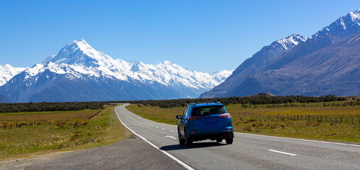 Landscape view of  mountain range near Aoraki Mount Cook and the road leading to Mount Cook Village...