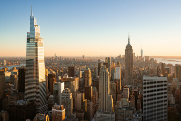 New York City aerial skyline of Midtown skyscrapers. The cityscape view extends all the way to...