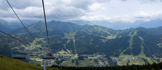 Steel cables wide panorama Belvedere view of cable cars in Alpine lanscape with French Alps ski...
