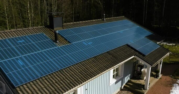 Energy producing station generating solar power on a house roof - CGI animation