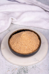 Breadcrumbs on grey background. Breadcrumbs flour in bowl