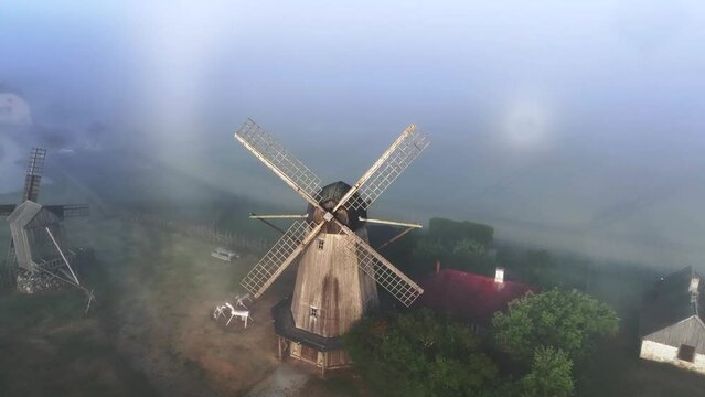 A rare weather phenomenon ringed glory behind Angla windmill in Saaremaa. Estonia.