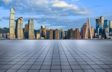 Obraz premium City square and skyline with modern buildings in Chongqing at sunset, China.