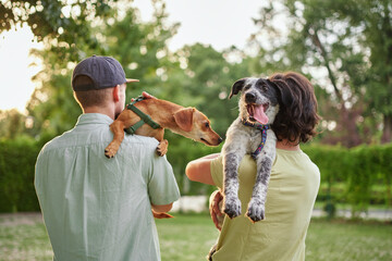 Support, care or happy family, men and kids bonding with foster puppy or pet and enjoying time together. High quality photo